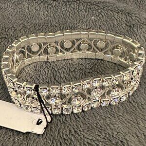 Silvertone stretch bracelet, with hearts and cubic zerconia by Thalia Soda.